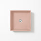 Square concrete basin in Rose, a soft dusty pink with subtle grey undertones, shown from above against a white background.