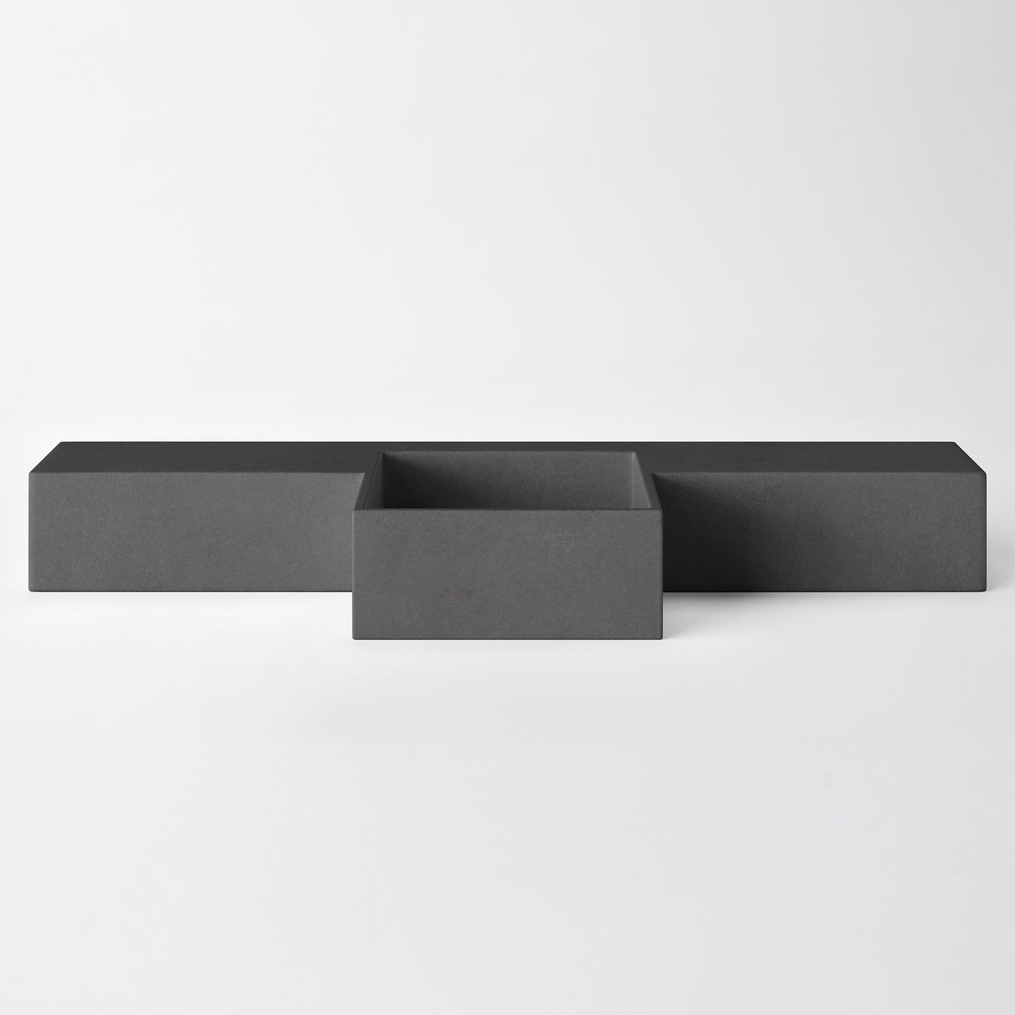 Baly Semi-recessed concrete vanity, wall-mounted without brackets. Slim 200 mm profile with an integrated cylindrical basin, hand-cast in GFRC concrete for a smooth, matte finish. Designed for tight spaces, the seamless surface prevents water pooling and creates a refined, minimalist look. 