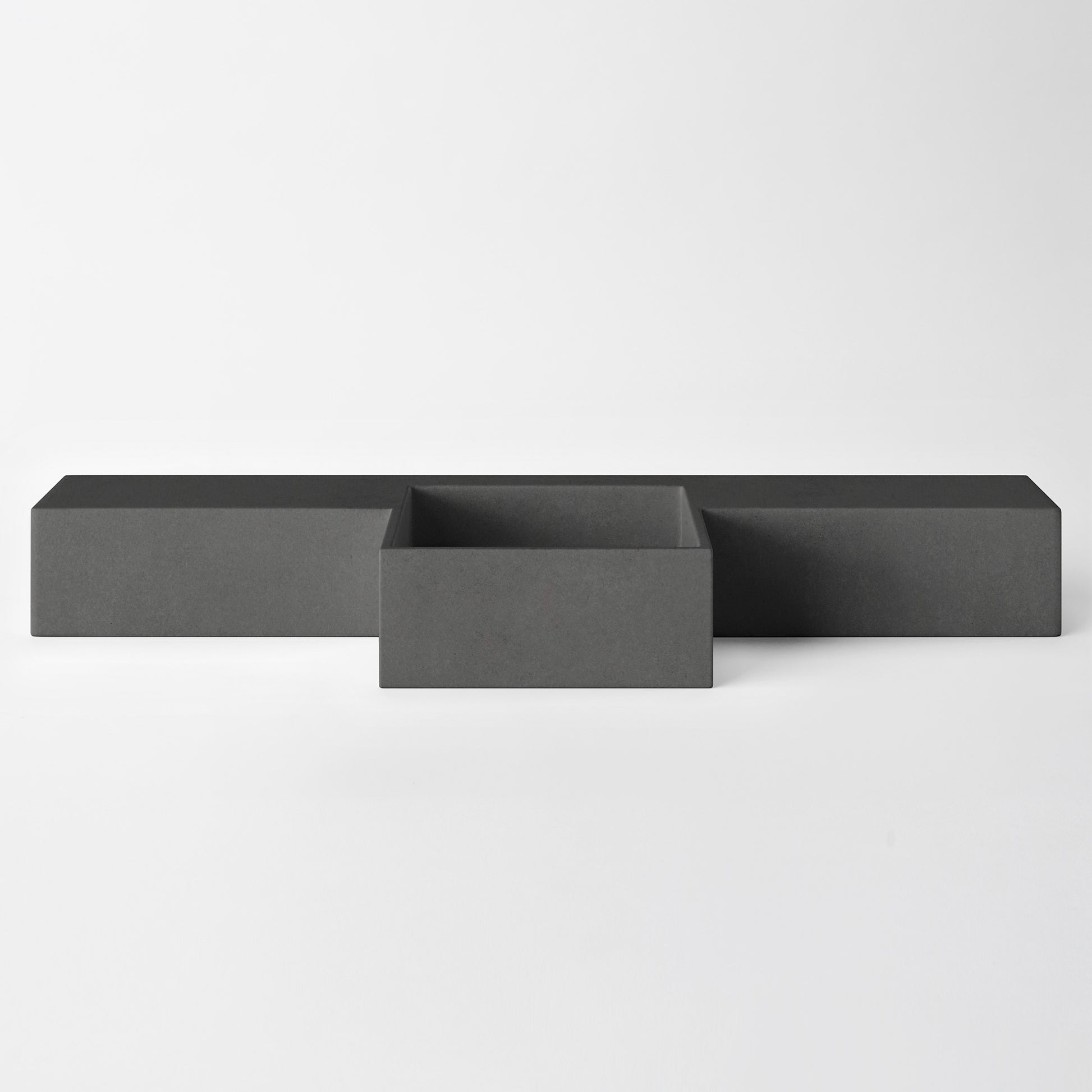 Baly Semi-recessed concrete vanity, wall-mounted without brackets. Slim 200 mm profile with an integrated cylindrical basin, hand-cast in GFRC concrete for a smooth, matte finish. Designed for tight spaces, the seamless surface prevents water pooling and creates a refined, minimalist look. 