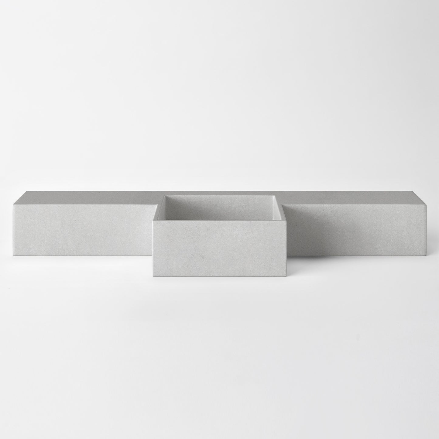 Baly Semi-recessed concrete vanity, wall-mounted without brackets. Slim 200 mm profile with an integrated cylindrical basin, hand-cast in GFRC concrete for a smooth, matte finish. Designed for tight spaces, the seamless surface prevents water pooling and creates a refined, minimalist look. 