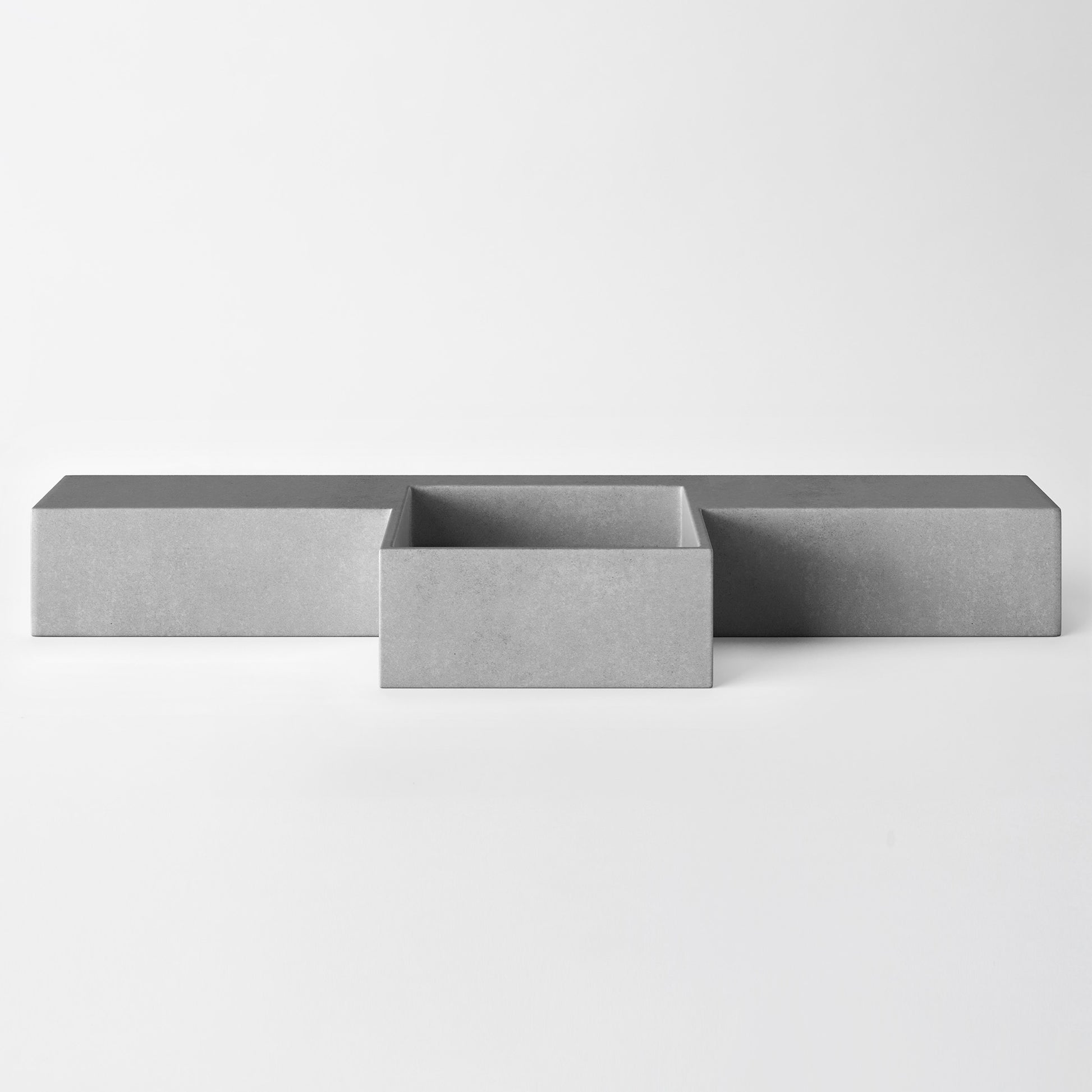 Baly Semi-recessed concrete vanity, wall-mounted without brackets. Slim 200 mm profile with an integrated cylindrical basin, hand-cast in GFRC concrete for a smooth, matte finish. Designed for tight spaces, the seamless surface prevents water pooling and creates a refined, minimalist look. 