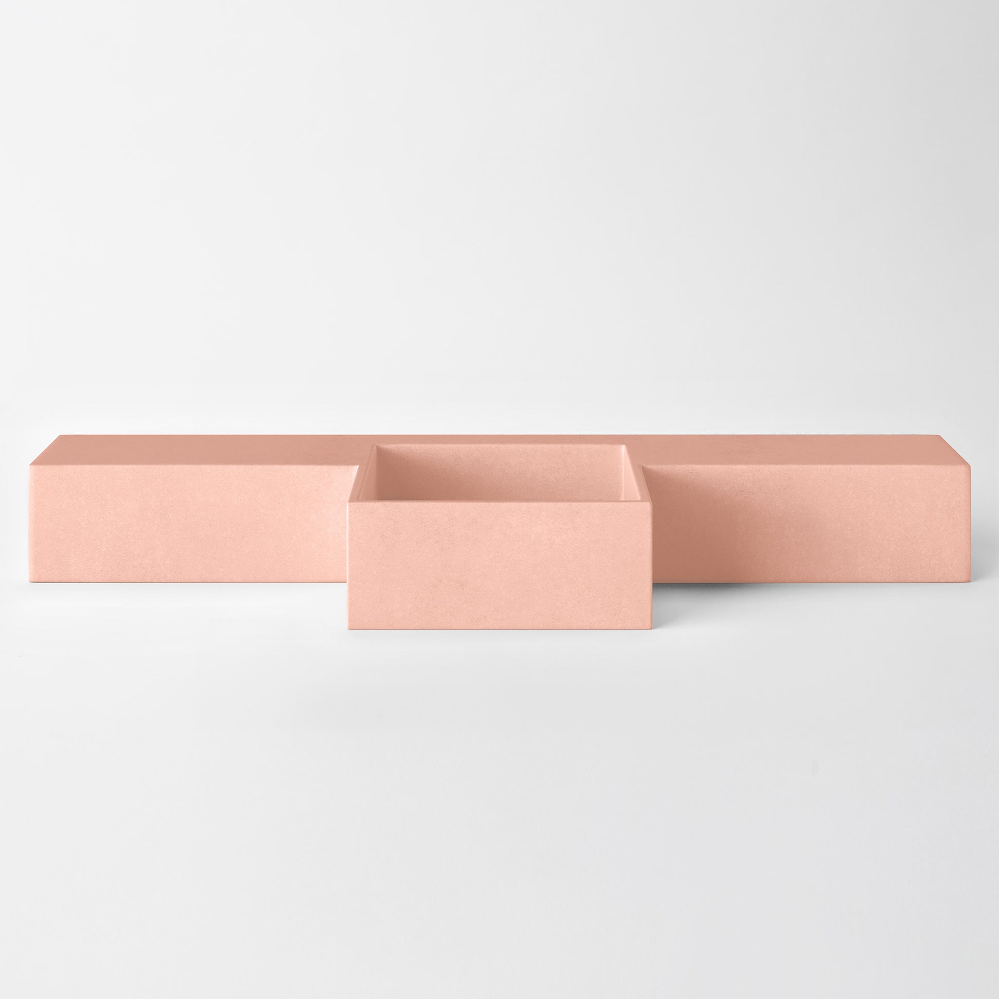 Baly Semi-recessed concrete vanity, wall-mounted without brackets. Slim 200 mm profile with an integrated cylindrical basin, hand-cast in GFRC concrete for a smooth, matte finish. Designed for tight spaces, the seamless surface prevents water pooling and creates a refined, minimalist look. 