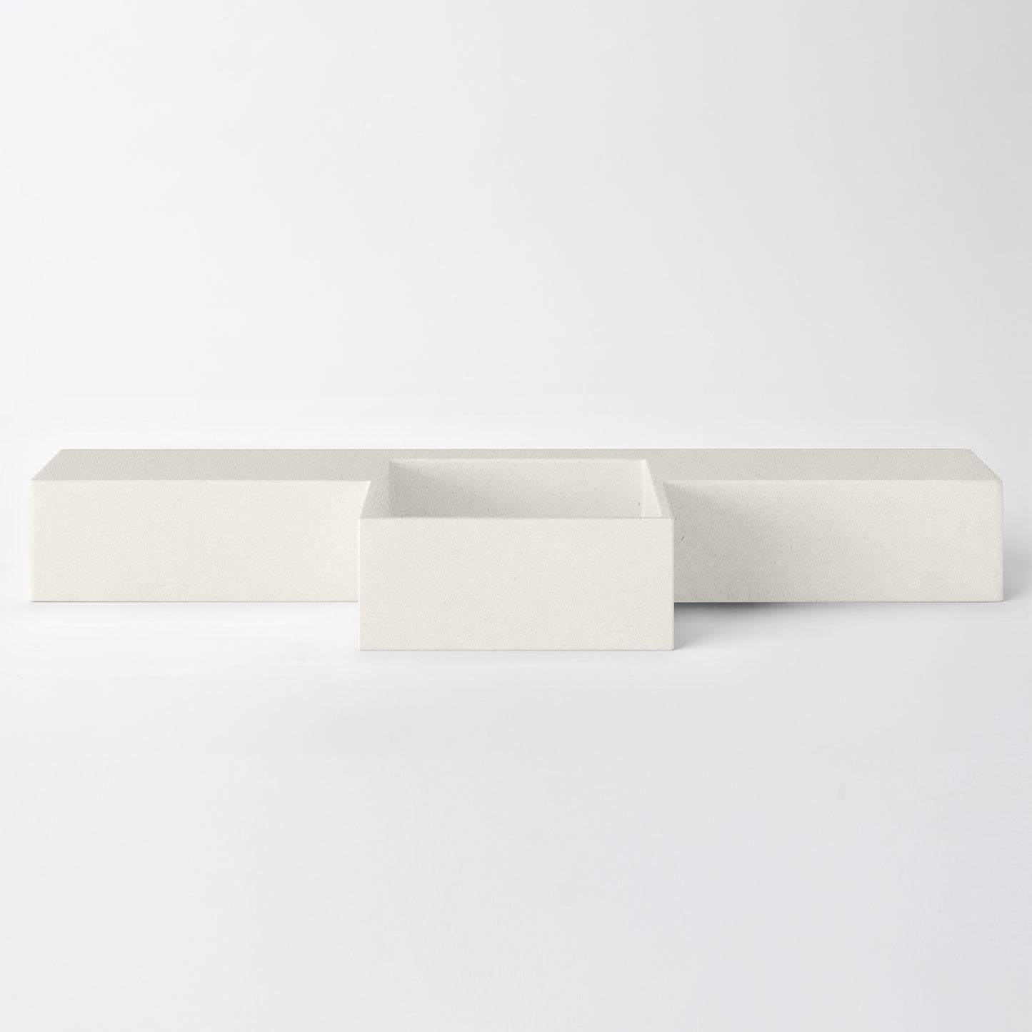 Baly Semi-recessed concrete vanity, wall-mounted without brackets. Slim 200 mm profile with an integrated cylindrical basin, hand-cast in GFRC concrete for a smooth, matte finish. Designed for tight spaces, the seamless surface prevents water pooling and creates a refined, minimalist look. 