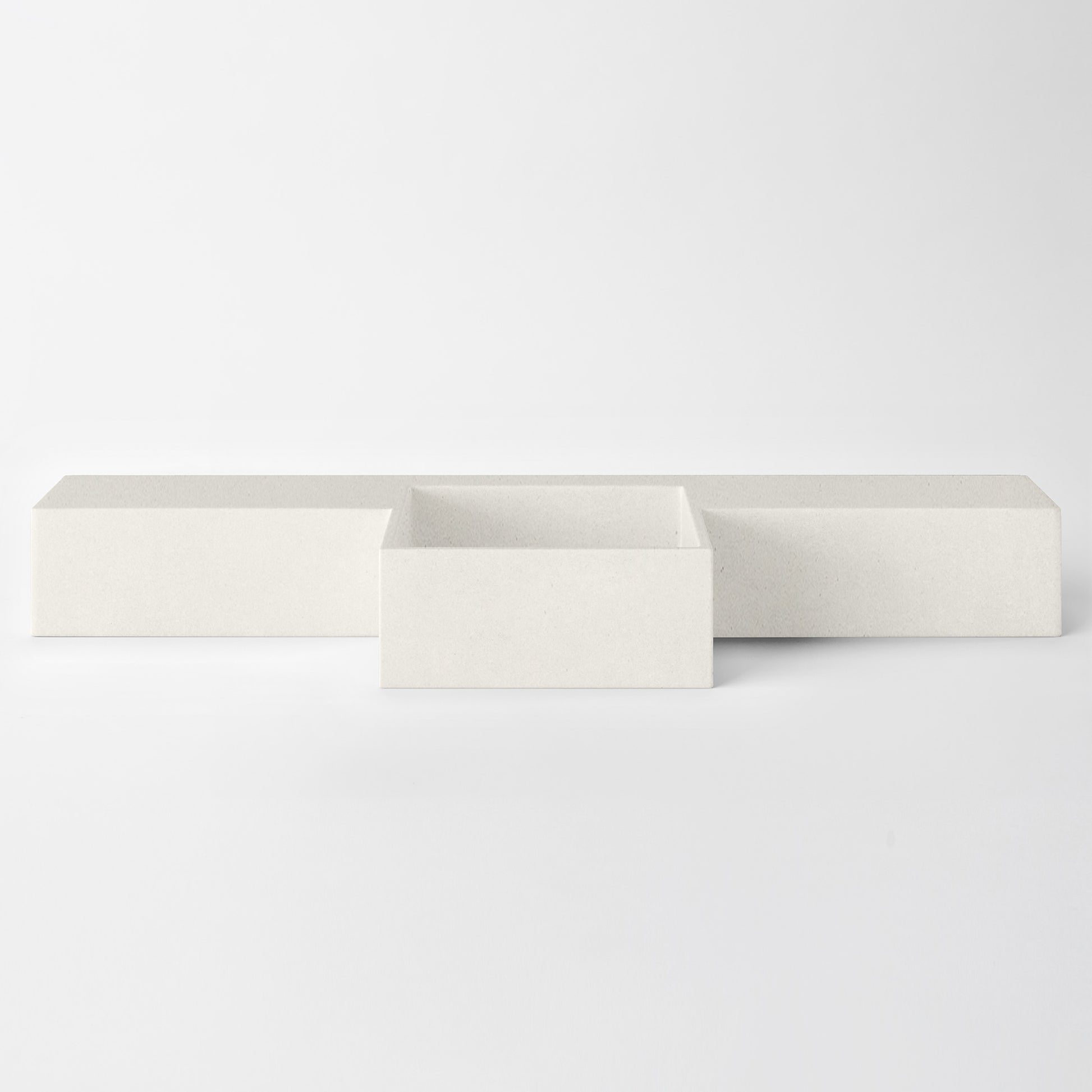 Baly Semi-recessed concrete vanity, wall-mounted without brackets. Slim 200 mm profile with an integrated cylindrical basin, hand-cast in GFRC concrete for a smooth, matte finish. Designed for tight spaces, the seamless surface prevents water pooling and creates a refined, minimalist look. 