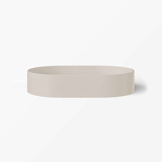 Bilya oblong concrete basin in Husk, a warm pale grey, shown as a straight-sided vessel basin.